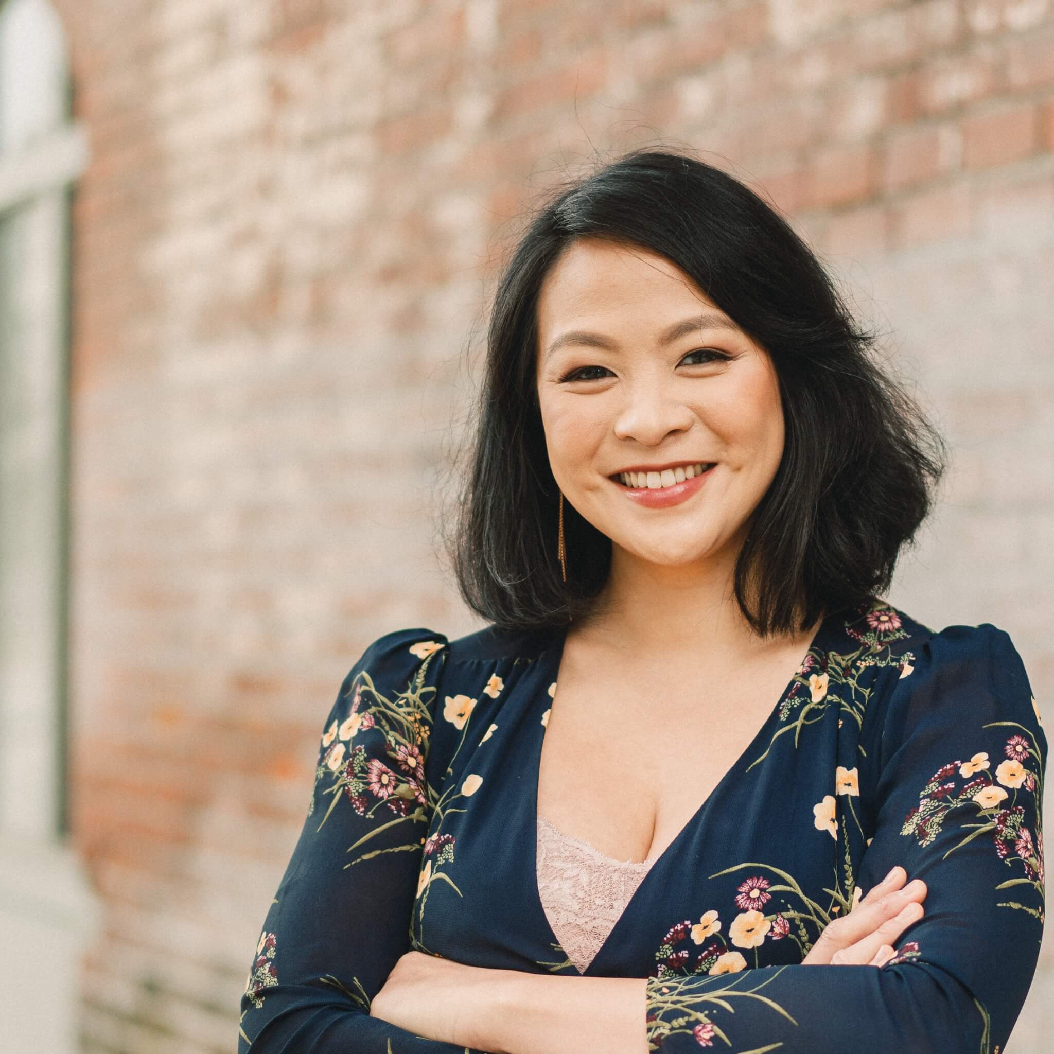 Image of a headshot of Laura Toh.