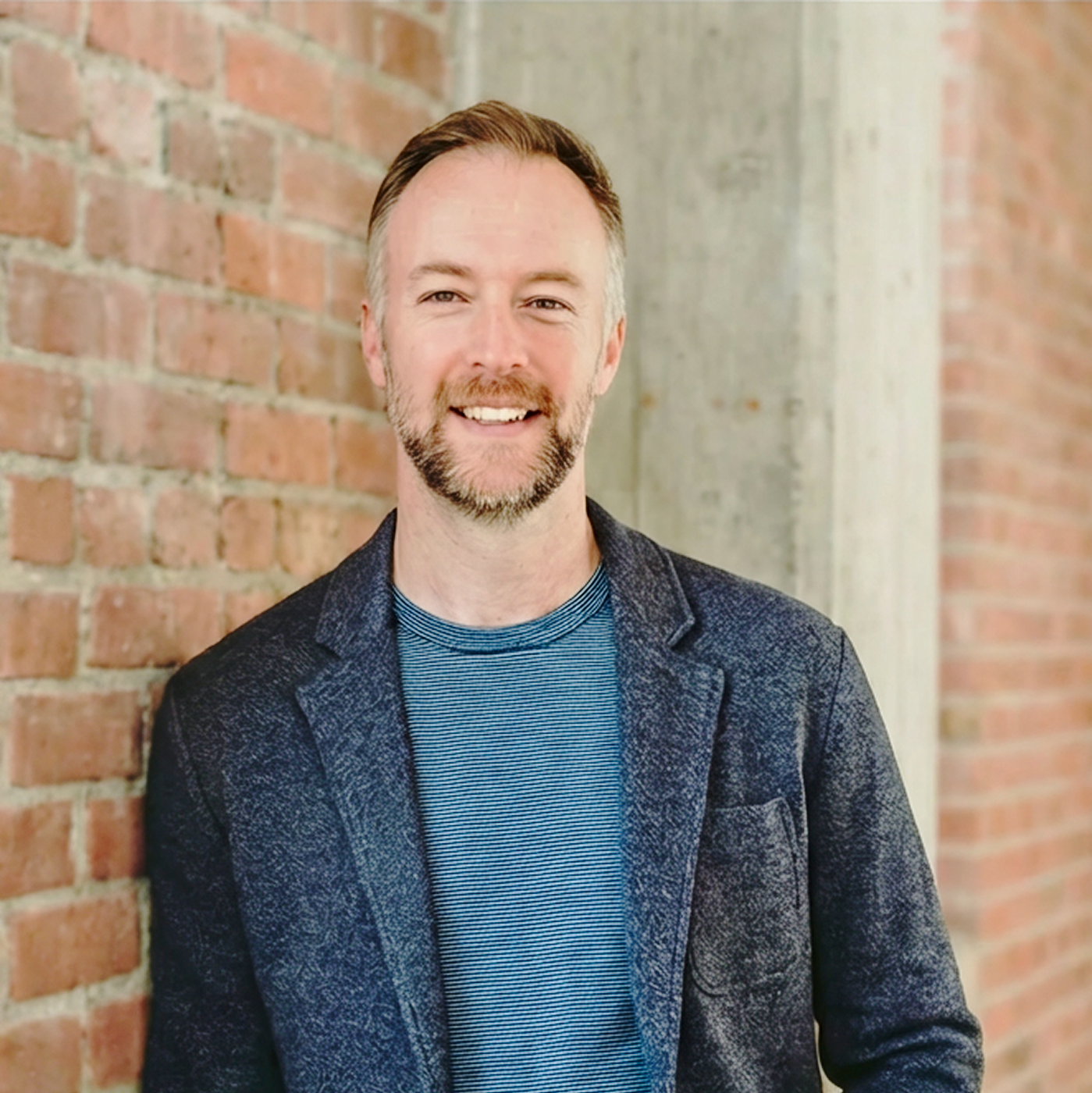 Image of a headshot of Zach Bartholomew.